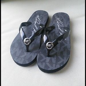 MK Flip Flops.